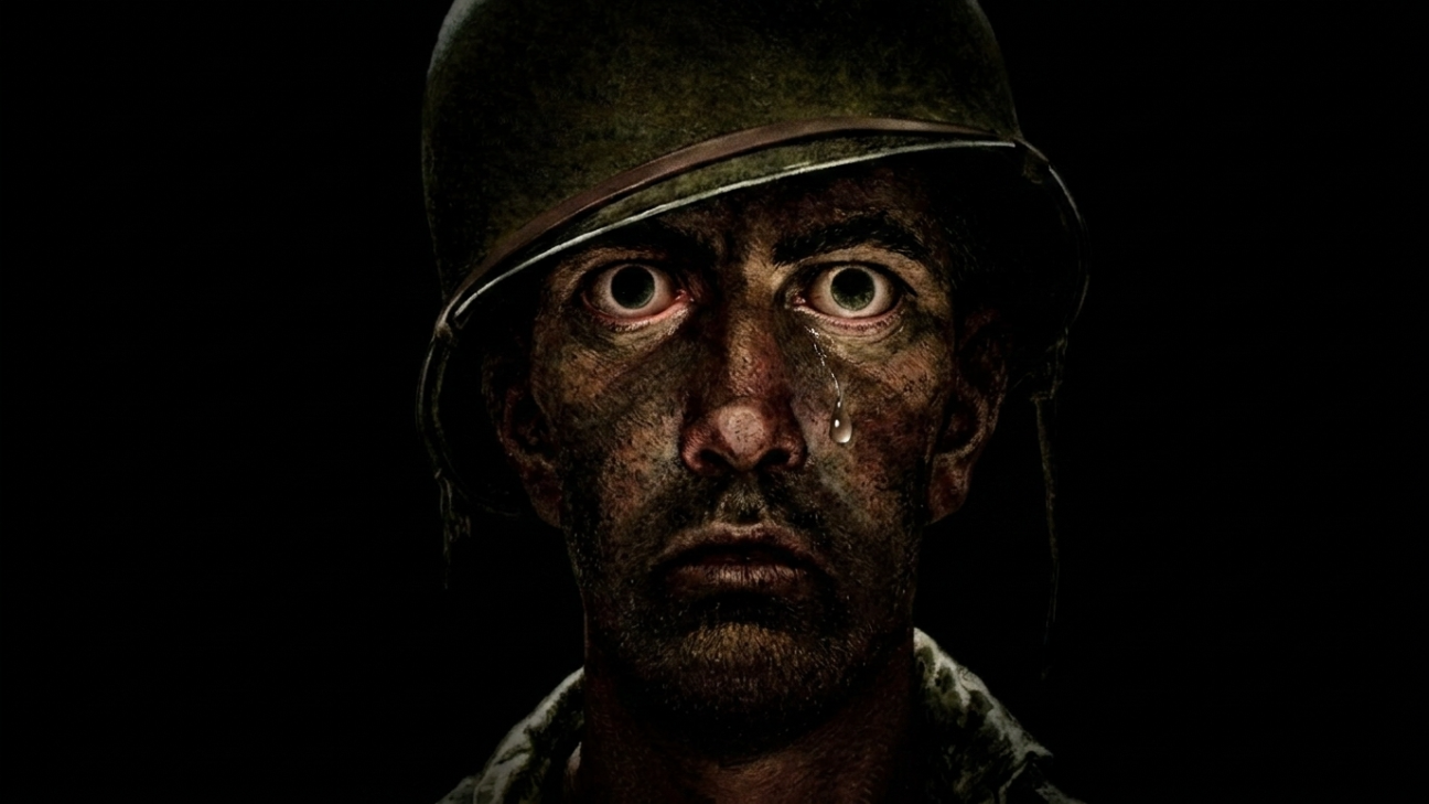Soldier with thousand yard stare and tear, dark portrait